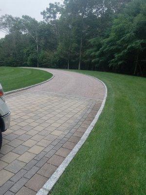 Brick pavers and cobblestone entrance.