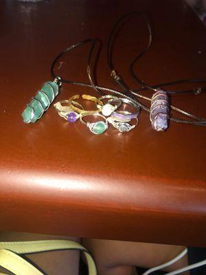 Hand made rings and necklace with crystals.