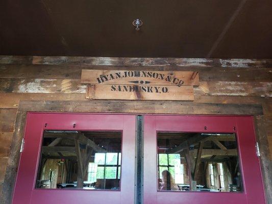 The barn was reconstructed from the original wood and features exposed wood beam ceilings.