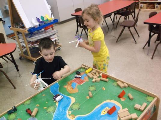 Setting up the environment that allows children to work together on a common goal is important.