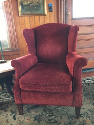 The proportions of this wing chair fit our house perfectly.  Gozzo repaired chair and covered it with textured, wine-colored fabric.