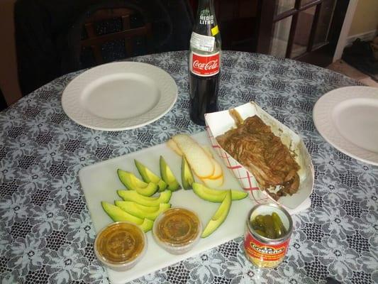 Carnitas. Everything but the cheese is from this store. All that cost like 8 bucks.