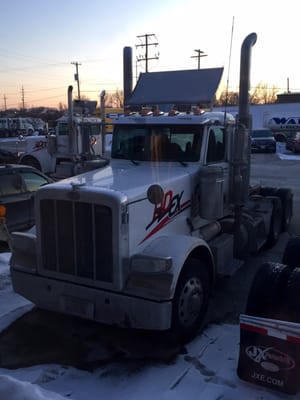 Tractor parked ready to pull Van Trailer