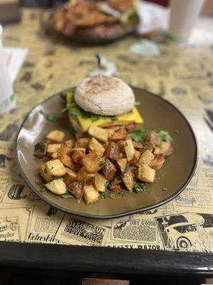 Vegan egg and cheese with tomato and spinach