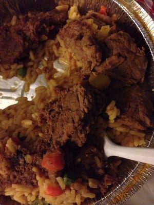 Beef stew with yellow rice