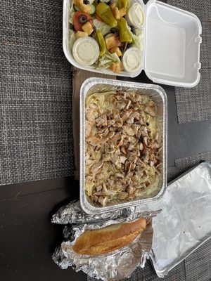 Chicken Alfredo with salad and bread