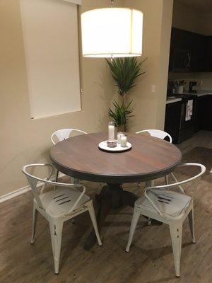 Beautiful heavy teak table with a grey stain.