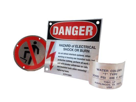 Etched metal nameplate warning tags well-suited for industrial environments.