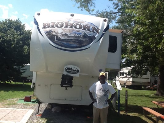 The owner of RC Detailing after he finished washing and waxing from RV.