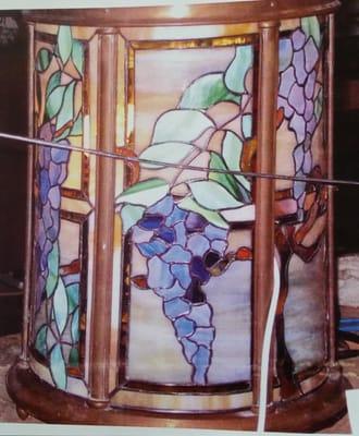 Custom designed and slumped wisteria paneled lamp for client.