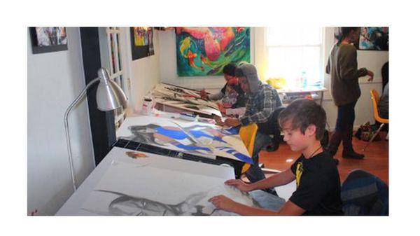 Amario's Art Academy studio with students at work.