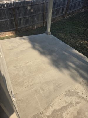 Back porch after resurfacing. You can see where the Contractor ran out of material and ditched the rest of the job.