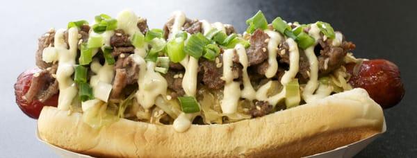 Bulgogi Dog Korean Beef Bulgogi, Asian Slaw, Green Onions, Sesame Seeds and Bulgogi Mayo on your Quarter Pounds All beef Dog