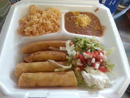 Chicken flautas. Seasoned chicken wraped in corn tortillas, then fried. Served with refried beans,  rice and salad side. $5.00