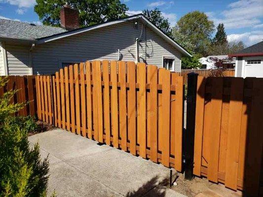 Two electrically operated remote controlled six foot vehicle gates plus a four foot manually operated gate for people next to the home.