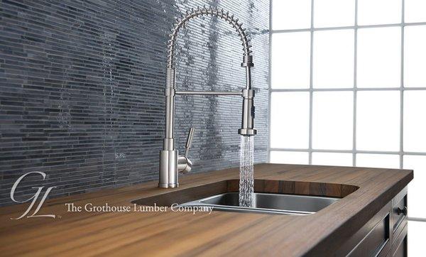 This traditional kitchen designed by Blanco features a Edge Grain wood countertop in Burmese Teak.