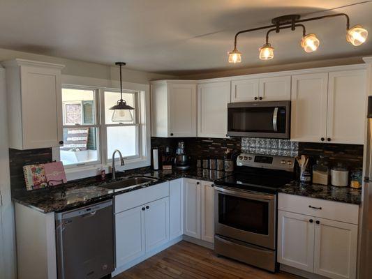 Whole new kitchen remodel along with tiled backsplash and re-finished hardwood floors