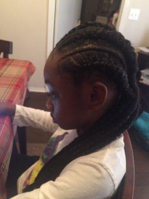 First time getting her hair braided with weave and I Love it.