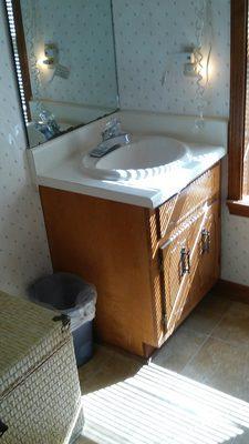 Upstairs sink in bathroom area