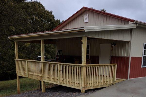 Wood deck with cover on existing metal building