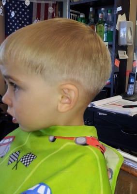 We do kids!  This awesome client was just 4 years old at this cut. ~Styled by Red.