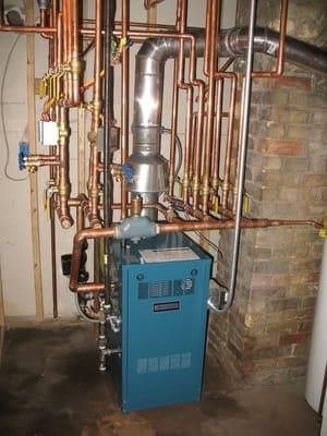 Boiler installation with multiple zoning for maximum heating efficiency.