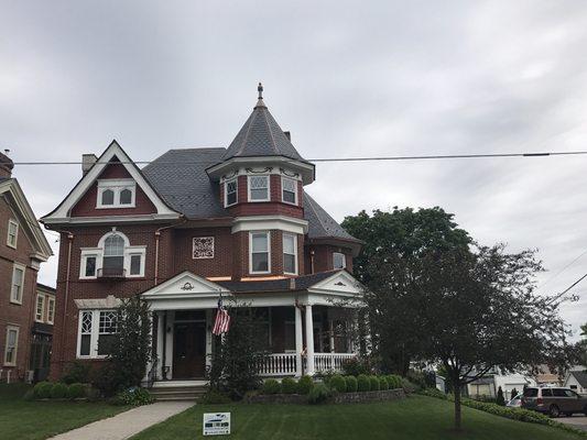 Slate roofing and copper gutter