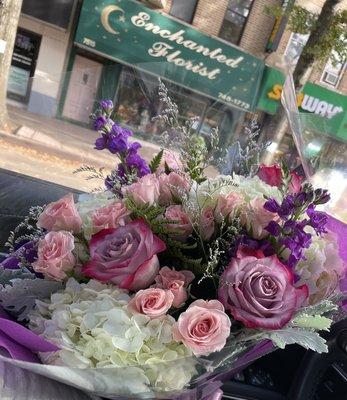 Flower Bouquet with storefront in background