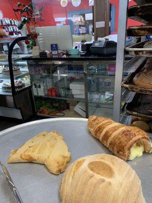 Empanada, crème cone, and a sweet concha.