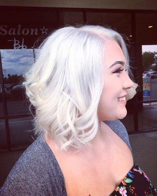 Icy blonde. Started at a darker blonde with some leftover pink from a previous color.