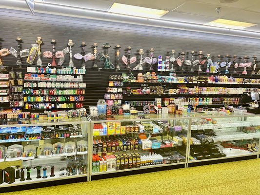 big selection of cigarettes, lighters and torches