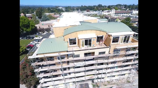 Installed curved metal roof panels.