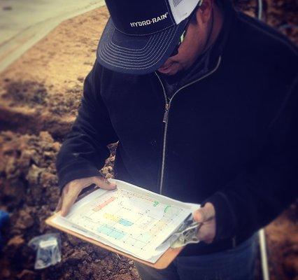 Team member reviewing the installation plans at Union State Bank.