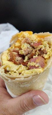 Yep , identical Bacon and Egg Burrito from Mariachi's...wow....loaded, lean bacon chunks, plenty of cheese...Huge.  Yum.