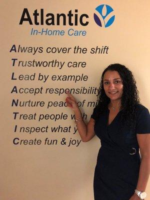 Kerri Johnson, Client Care Director, points out our principles.