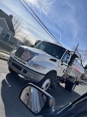 BLOCKING THE ENTIRE STREET...CARS CANNOT GET THRU