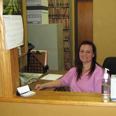 Jennie at our reception window. You'll be met with a warm friendly face.