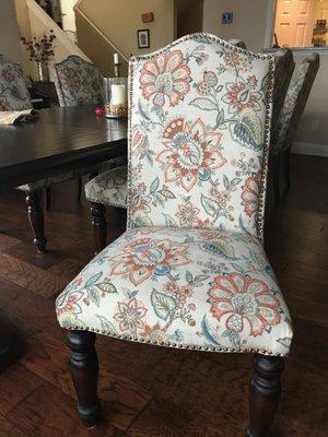 Newly re-upholstered formal dining room chair, with nailheads