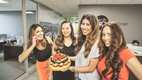 In order: Keila, Josephine, Angelica, and Cynthia celebrating another successful loan closing for a client.