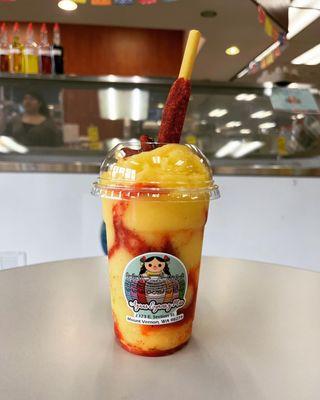 Mangonada (mango smoothie with a mixture of chamoy and tajin)