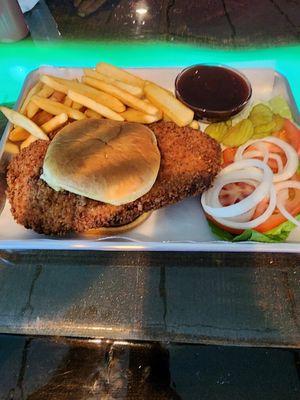 Hand breaded pork tenderloin sandwich with steak fries