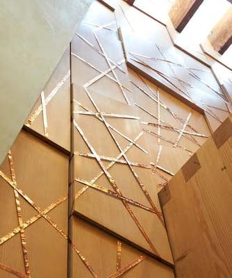 Storyline Project: each copper strip, on our bimah wall, has a member's story inscribed on it.