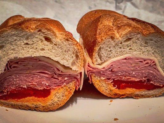 12. Italian Hero-Cappo Sandwich. Soppresatta, mortadella, salami, provolone, & roasted red peppers.  $14.95 + tax + tip