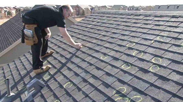 Doing a roof inspection of hail damage of  last year.