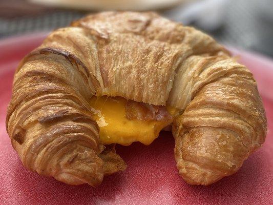 Breakfast croissant with bacon, egg and cheese