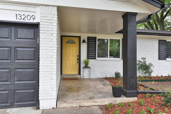 HCS restored this homes exterior. The outside paint, gutters and door are all examples of what HCS can do for your home.