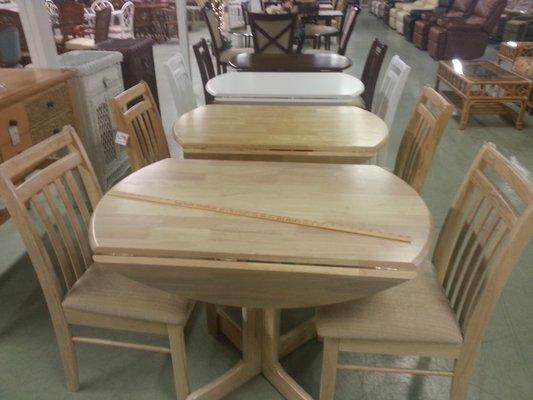 40" drop leaf table and 2 chairs, extra chairs available