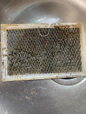 Kitchen screen above the stove is dirty