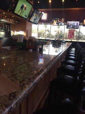 Long bar, lots of TVs!