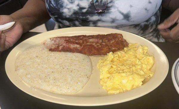 Corned Beef Hash soft scrambled eggs and grits.